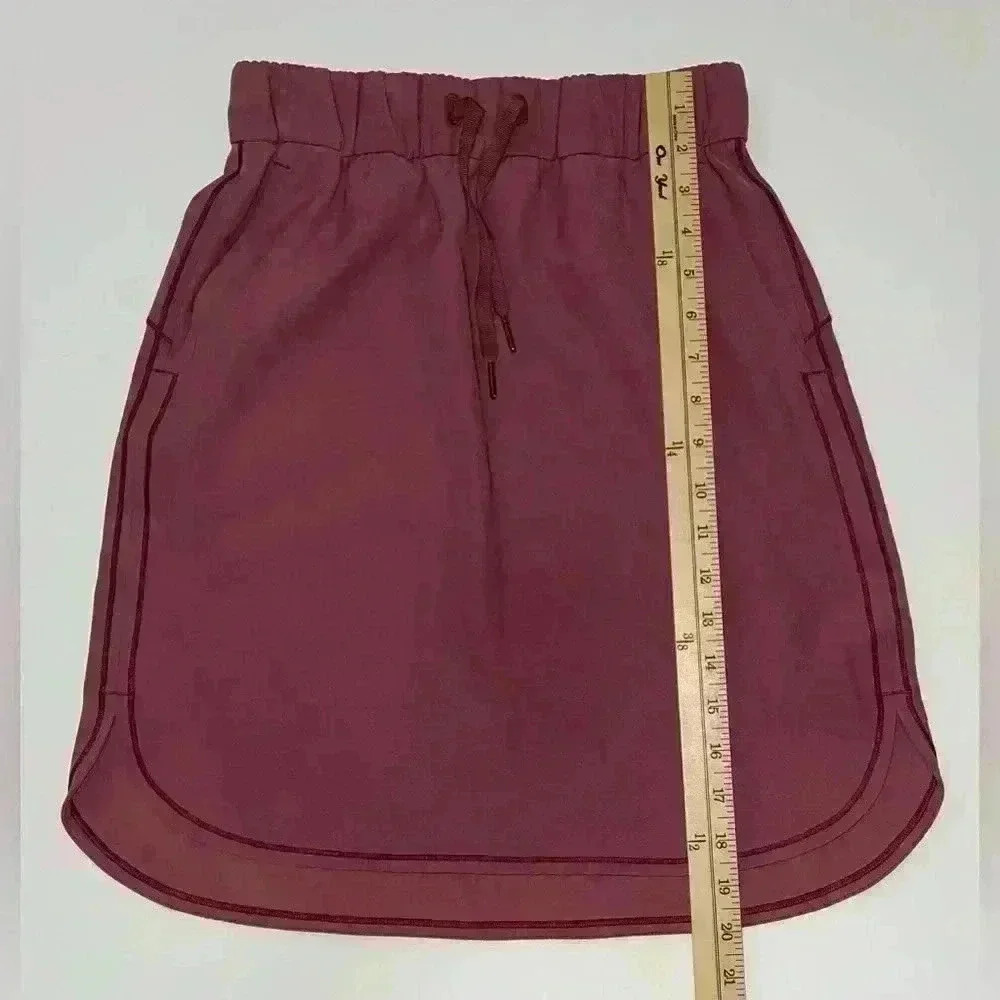 Lululemon On The Fly Skirt
Woven Misty Merlot  Rose Pink Size 4 - Picture 7 of 9
